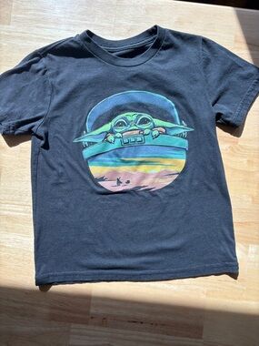 MAD Engine Black Tee with Green Baby Yoda Character and Sunset Graphic